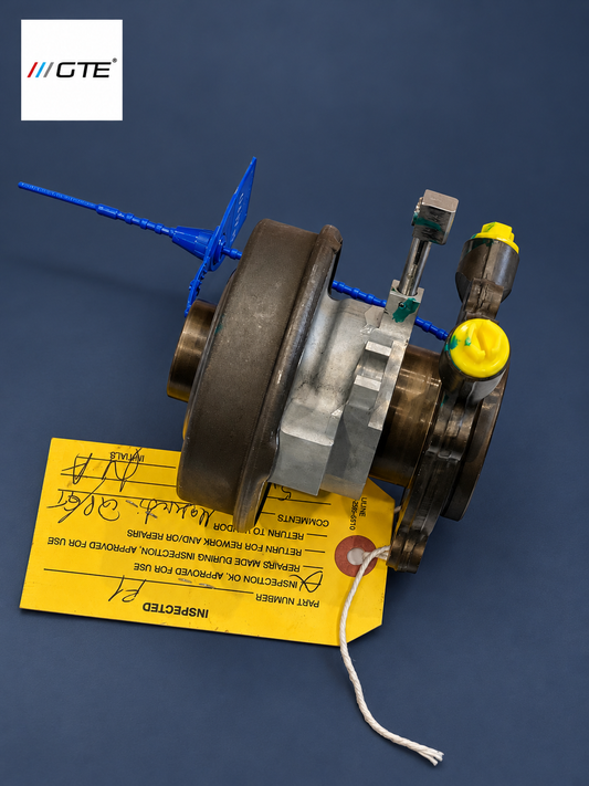 Rebuilt hydraulic clutch release bearing, side view with inspection tag