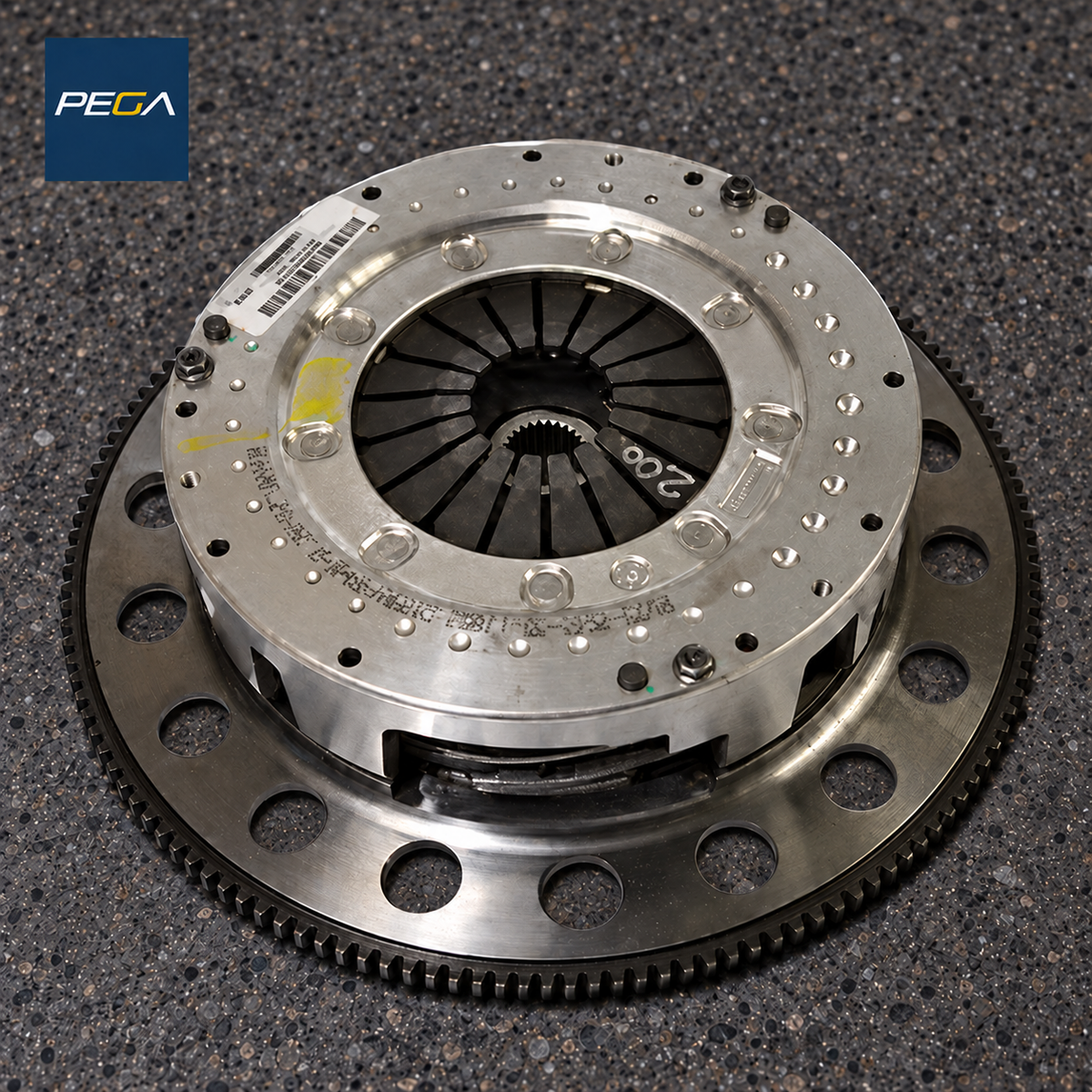 Aston Martin clutch and flywheel service example with diaphragm fingers, barcode label and colored inspection marks