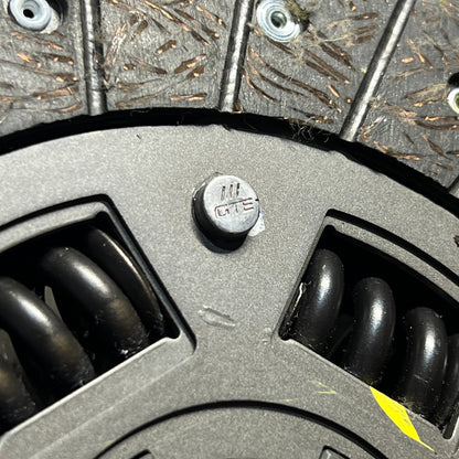Close-up of Ferrari F50 clutch disc friction material and rivet