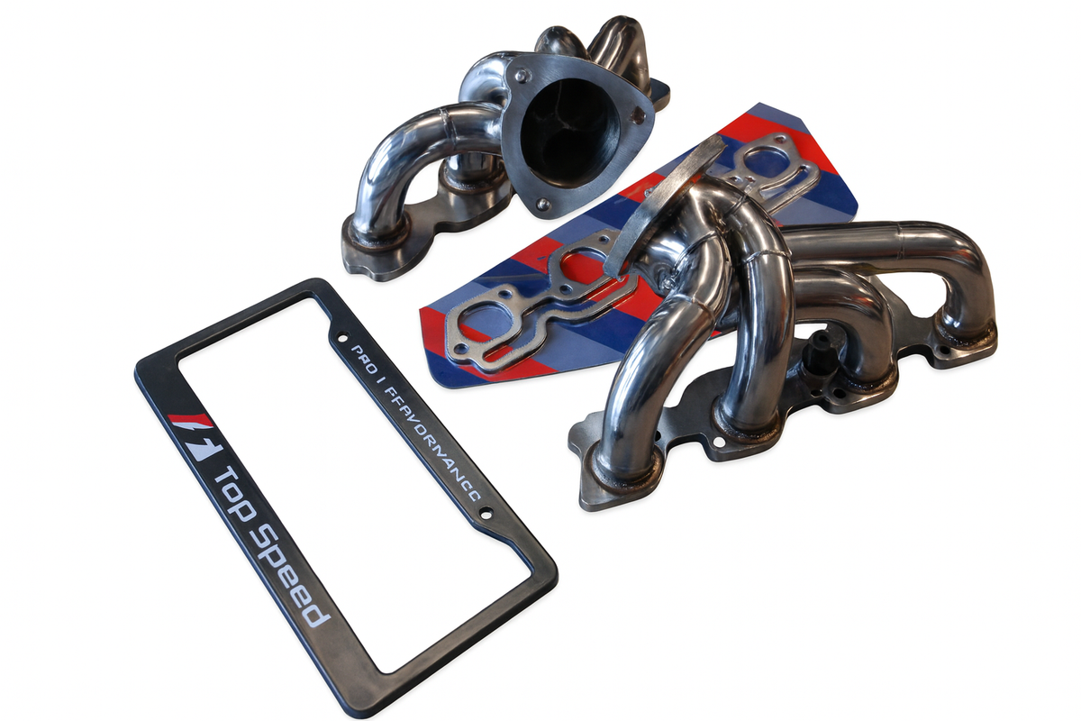 Ferrari California exhaust header components with gaskets