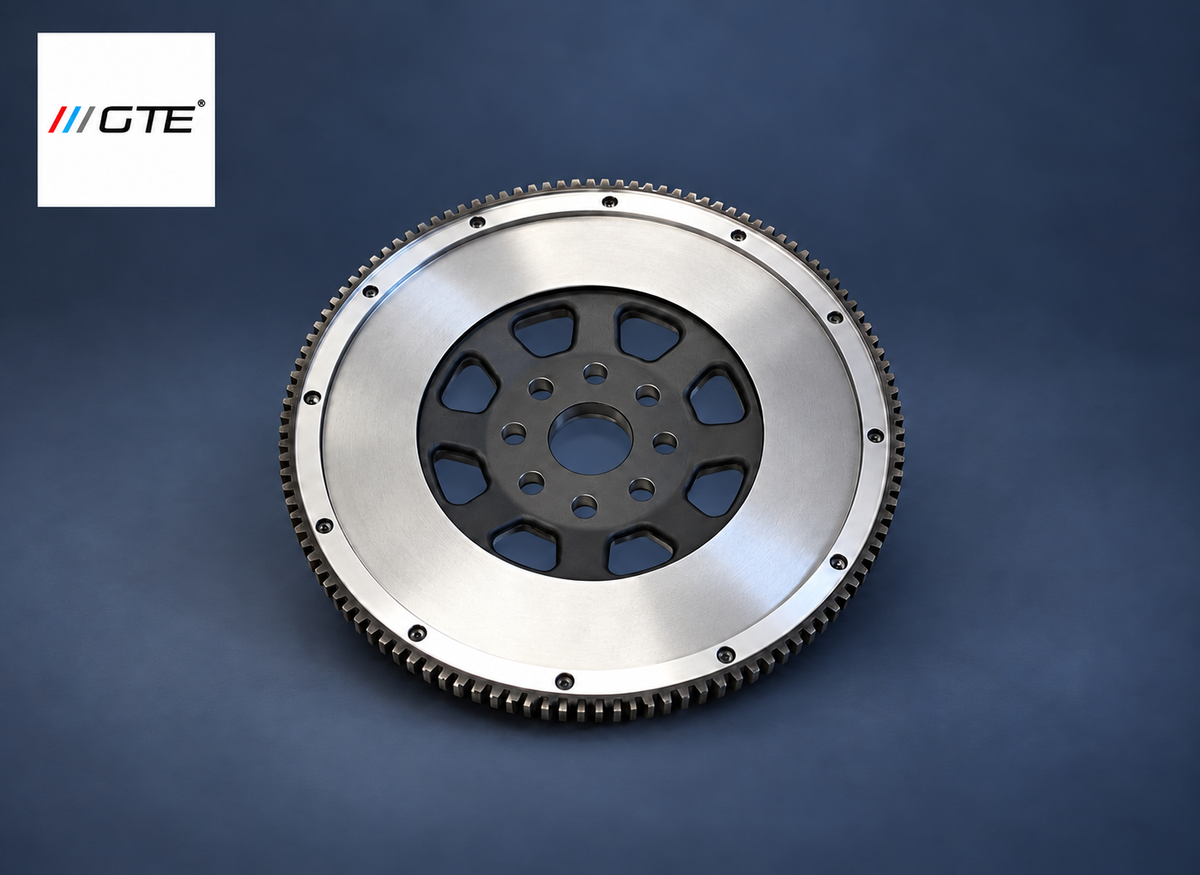 GTE flywheel service example showing the machined friction face, black center and ring gear; exact application varies.