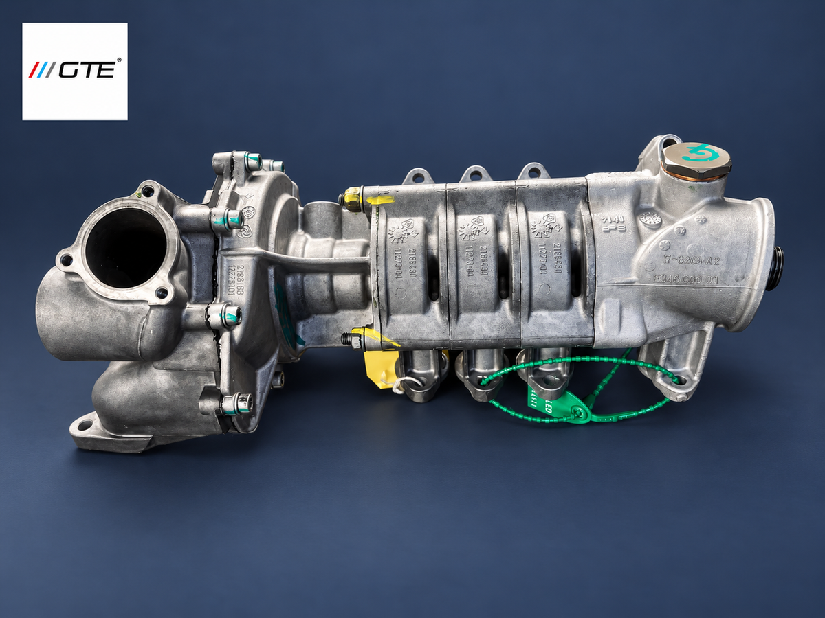 GTE Engineering water-pump rebuild service example, side view of housing and connections; identify the actual pump by its reference and vehicle