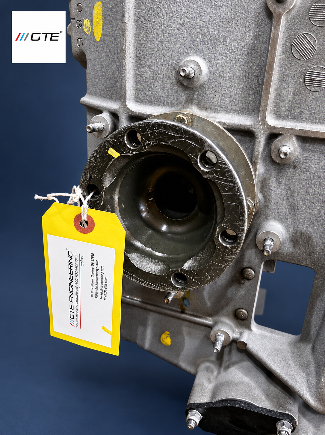Ferrari 360 Modena transmission rebuild, output flange close-up with inspection tag.