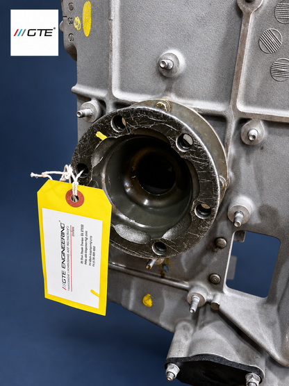 Ferrari 360 Modena transmission rebuild, output flange close-up with inspection tag.