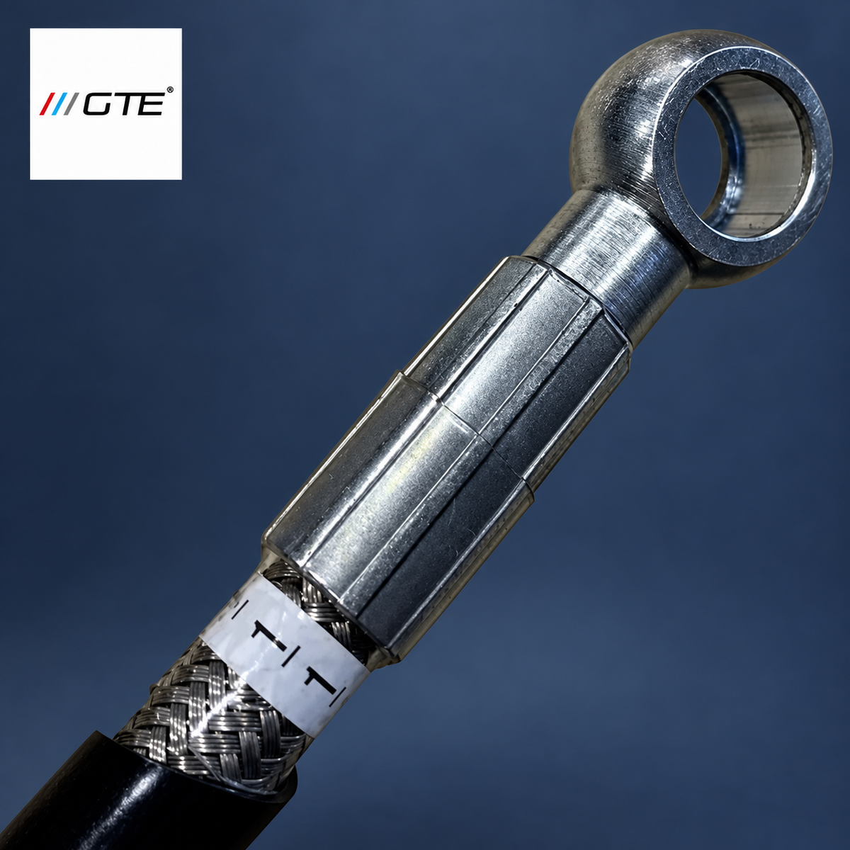 GTE hydraulic hose banjo fitting and crimp, shared workmanship detail