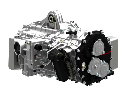 Technical rendering of a McLaren Graziano dual-clutch transaxle showing housing, connectors and black covers.
