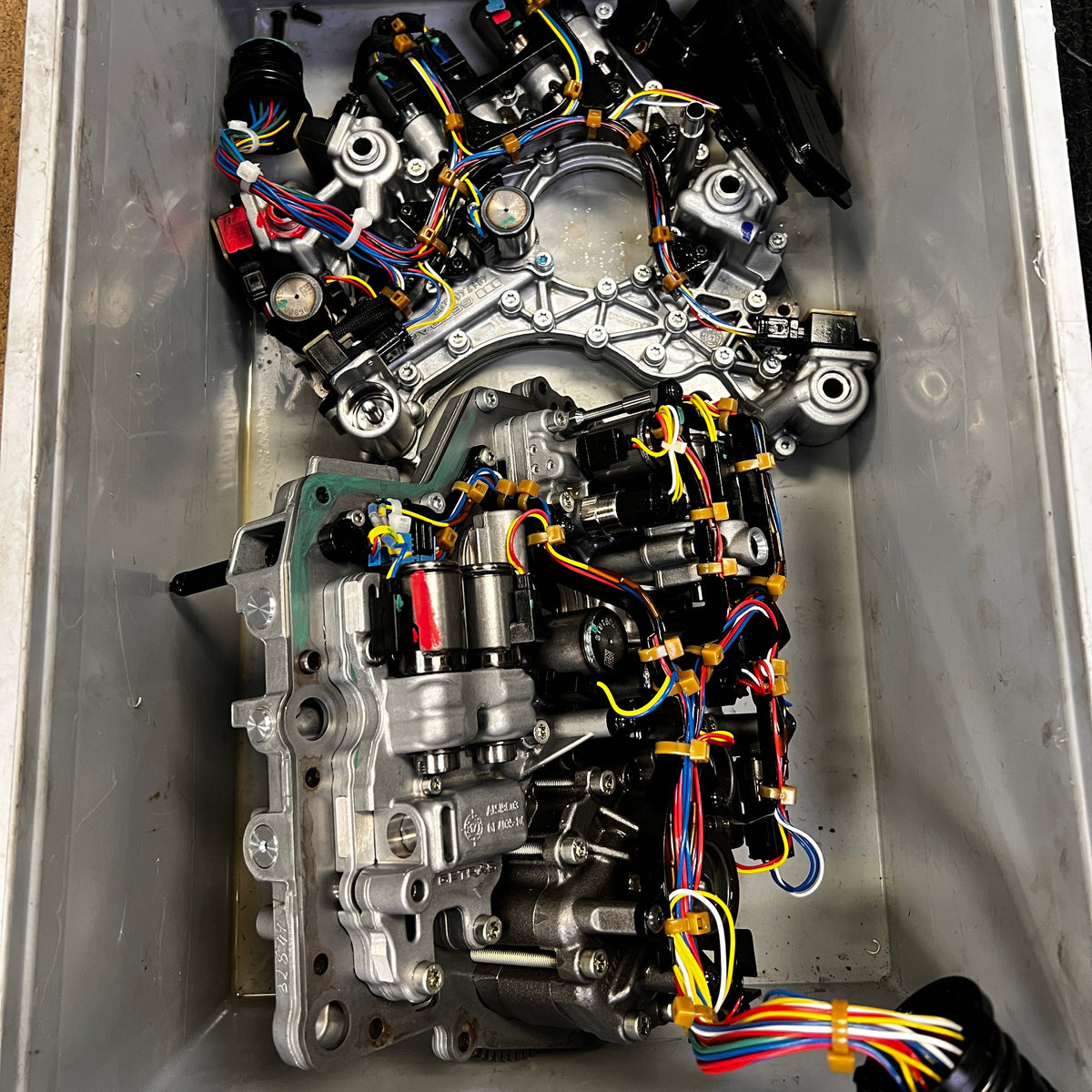 Opened Getrag 7DCL750 transmission with hydraulic components exposed